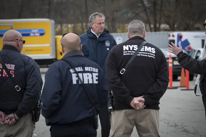 Mayor Bill de Blasio tours Fort Totten to greet EMTs and paramedics dispatched by FEMA